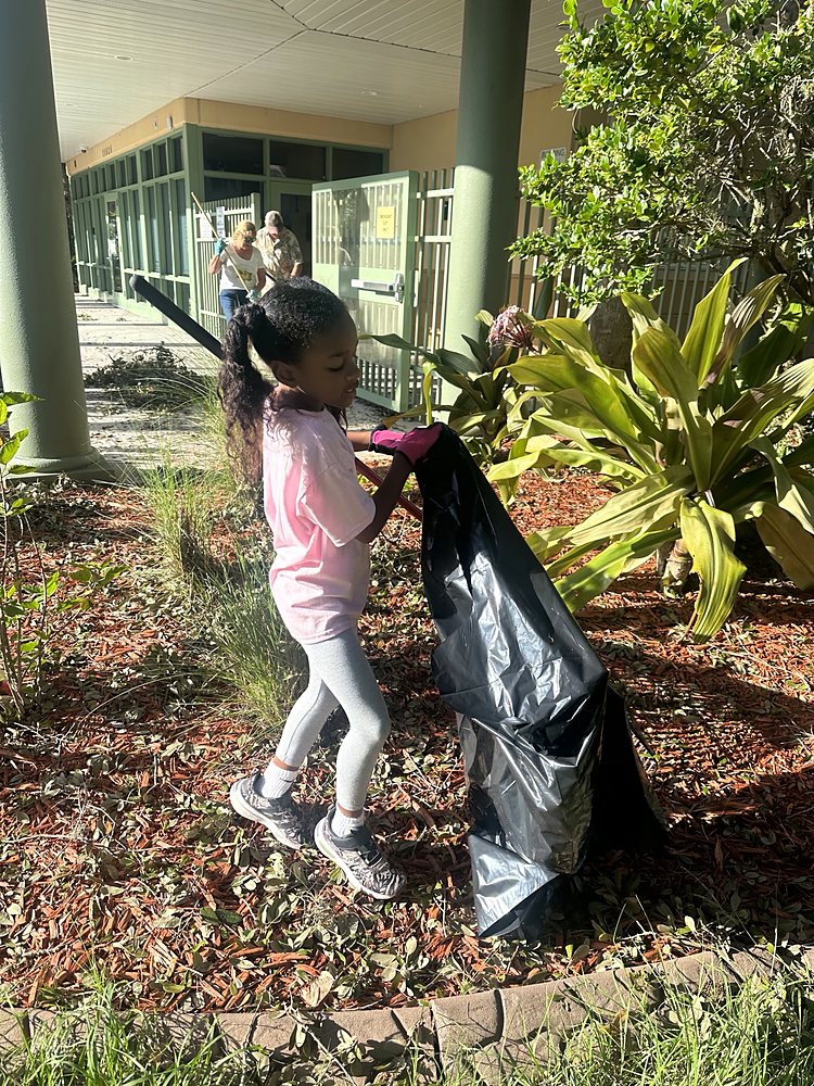 A child at a community cleanup